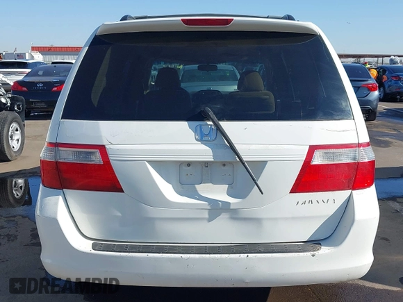 2005 Honda Odyssey EX with VIN 5FNRL38465B081716, listed as a IAAI auction lot 41998956 with 173,182 mi miles and . Bid and sale history available at carsss.com. Image 17.