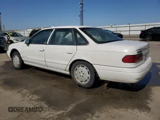 1994 Ford Taurus GL z VIN 1FALP52U7RG261559, wystawiony jako Copart lot #55681304 z przebiegiem 28 675 mil mil oraz Szkoda całkowita • Salvage title. Historia ofert i sprzedaży dostępna na DreamBid. Obrazek 2.