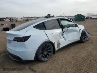 2022 Tesla Model Y Long Range with VIN 7SAYGAEE1NF540574, listed as a Copart auction lot 49001125 with 40,806 mi miles and Salvage Title. Bid and sale history available at carsss.com. Image 3.