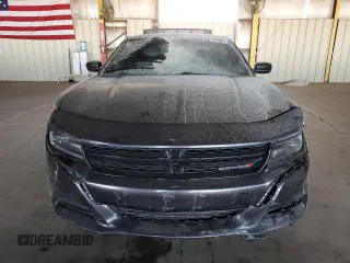 2019 Dodge Charger SXT z VIN 2C3CDXBG0KH711690, wystawiony jako Copart lot #57724225 z przebiegiem 114 464 mil mil oraz Szkoda całkowita • Salvage title. Historia ofert i sprzedaży dostępna na DreamBid. Obrazek 5.