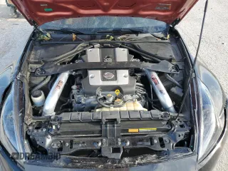 2014 Nissan 370Z z VIN JN1AZ4EH9EM636239, wystawiony jako Copart lot #69833264 z przebiegiem 110 802 mil mil oraz Szkoda całkowita • Salvage title. Historia ofert i sprzedaży dostępna na DreamBid. Obrazek 11.