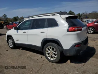 2016 Jeep Cherokee Altitude with VIN 1C4PJLCB9GW209643, listed as a Copart auction lot 47996565 with 167,005 mi miles and Salvage Title. Bid and sale history available at carsss.com. Image 2.