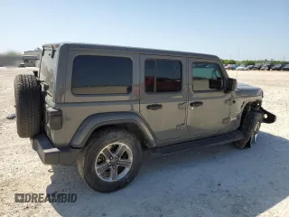 2022 Jeep Wrangler Unlimited Sahara with VIN 1C4HJXEG8NW164969, listed as a Copart auction lot 52241645 with 64,263 mi miles and Salvage title. Bid and sale history available at DreamBid. Image 3.