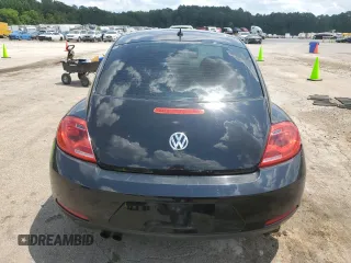 2015 Volkswagen Beetle Fleet Edition with VIN 3VWF17ATXFM645590, listed as a Copart auction lot 58234745 with 128,469 mi miles and Salvage title. Bid and sale history available at DreamBid. Image 6.
