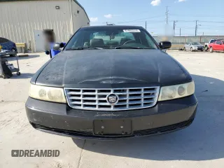 2002 Cadillac Seville Luxury SLS z VIN 1G6KS54YX2U154438, wystawiony jako Copart lot #67893314 z przebiegiem 115 313 mil mil oraz Szkody całkowita. Historia ofert i sprzedaży dostępna na DreamBid. Obrazek 5.