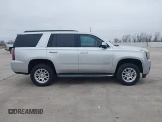 2015 GMC Yukon SLT with VIN 1GKS1BKC3FR253184, listed as a IAAI auction lot 41574610 with 152,543 mi miles. Bid and sale history available at carsss.com. Image 13.
