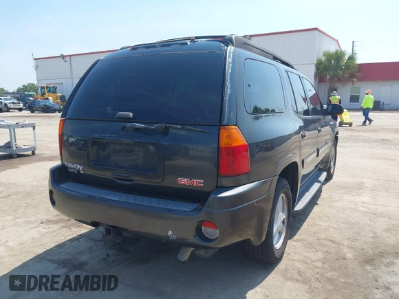 2003 GMC Envoy SLT with VIN 1GKES16S536169306, listed as a IAAI auction lot 42234834 with 239,144 mi miles and . Bid and sale history available at DreamBid. Image 4.