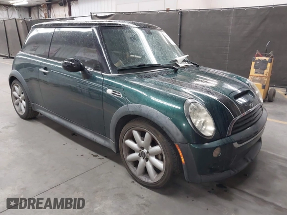 2006 MINI Hardtop S z VIN WMWRE33536TJ40341, wystawiony jako IAAI lot #42637418 z przebiegiem 93 338 mil mil oraz . Historia ofert i sprzedaży dostępna na DreamBid. Obrazek 1.