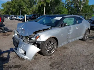 2012 Scion tC with VIN JTKJF5C77C3032559, listed as a IAAI auction lot 41892954 with 207,718 mi miles. Bid and sale history available at carsss.com. Image 17.