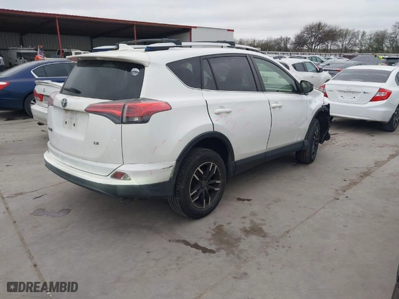 2016 Toyota RAV4 LE with VIN JTMZFREV9GD090539, listed as a IAAI auction lot 41774949 with 106,339 mi miles. Bid and sale history available at carsss.com. Image 4.