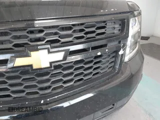 2015 Chevrolet Suburban LT with VIN 1GNSKJKC7FR199544, listed as a IAAI auction lot 42169017 with 219,219 mi miles and . Bid and sale history available at DreamBid. Image 6.