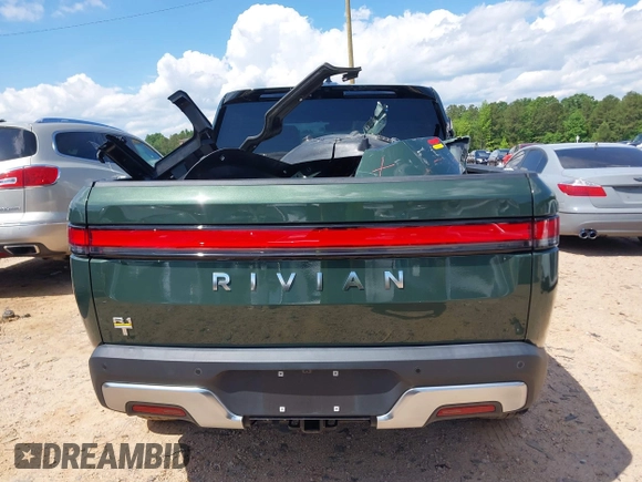2023 Rivian R1T Adventure z VIN 7FCTGAAAXPN019894, wystawiony jako IAAI lot #42168226 z przebiegiem 23 380 mil mil oraz . Historia ofert i sprzedaży dostępna na DreamBid. Obrazek 17.