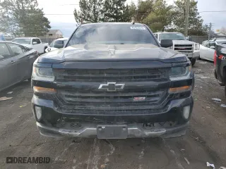 2018 Chevrolet Silverado 1500 LT with VIN 3GCUKREC2JG214570, listed as a Copart auction lot 43422015 with 145,465 mi miles and Salvage Title. Bid and sale history available at carsss.com. Image 5.