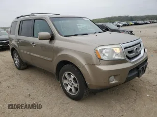 2011 Honda Pilot Touring with VIN 5FNYF4H99BB097019, listed as a Copart auction lot 53865365 with 260,357 mi miles and Salvage Title. Bid and sale history available at DreamBid. Image 4.