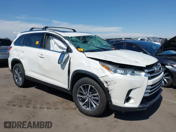 2019 Toyota Highlander SE with VIN 5TDKZRFH0KS314263, listed as a IAAI auction lot 42174469 with 72,682 mi miles and . Bid and sale history available at DreamBid. Image 1.
