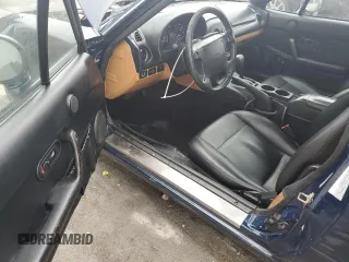 1996 Mazda MX-5 Miata z VIN JM1NA3531T0718068, wystawiony jako Copart lot #56614065 z przebiegiem 116 486 mil mil oraz Szkody całkowita. Historia ofert i sprzedaży dostępna na DreamBid. Obrazek 8.