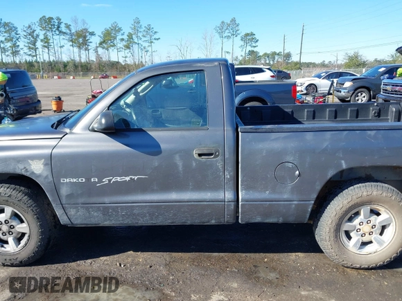 2001 Dodge Dakota with VIN 1B7FL26X91S342103, listed as a IAAI auction lot 41277465 with 157,993 mi miles. Bid and sale history available at carsss.com. Image 14.