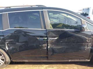 2013 Honda Odyssey EX-L with VIN 5FNRL5H6XDB090768, listed as a IAAI auction lot 42008759 with 116,052 mi miles and . Bid and sale history available at carsss.com. Image 13.