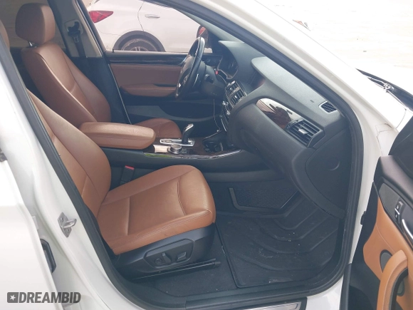 2015 BMW X4 xDrive28i with VIN 5UXXW3C53F0M88714, listed as a IAAI auction lot 41483692 with 132,054 mi miles. Bid and sale history available at carsss.com. Image 5.