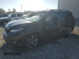 2019 Honda Passport Touring z VIN 5FNYF7H95KB011075, wystawiony jako Copart lot #77665464 z przebiegiem 74 231 mil mil oraz Nie do naprawy. Historia ofert i sprzedaży dostępna na DreamBid. Obrazek 1.