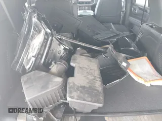 2023 Chevrolet Tahoe RST with VIN 1GNSCRKD2PR531394, listed as a IAAI auction lot 42147801 with 23,423 mi miles and . Bid and sale history available at DreamBid. Image 12.