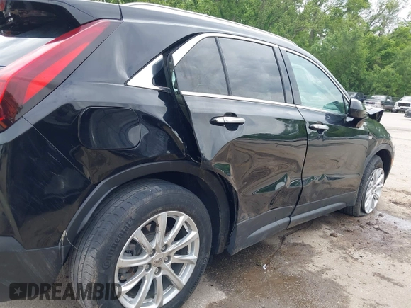 2021 Cadillac XT4 FWD Luxury with VIN 1GYAZAR44MF004295, listed as a IAAI auction lot 42196752 with 69,311 mi miles and . Bid and sale history available at DreamBid. Image 12.