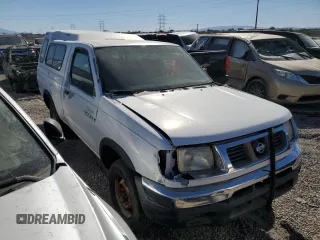 1998 Nissan Frontier XE with VIN 1N6DD21S9WC357098, listed as a Copart auction lot 77652604 with Not provided miles and Clean title. Bid and sale history available at DreamBid. Image 4.