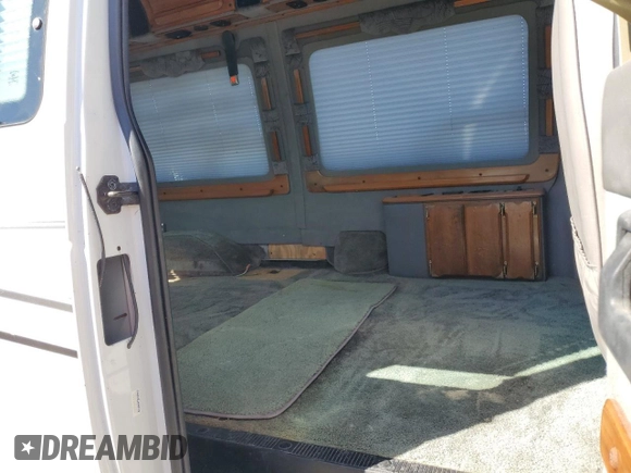 2000 Ford Econoline Cargo with VIN 1FDRE14W8YHC03112, listed as a Copart auction lot 43219225 with 177,781 mi miles and Salvage Title. Bid and sale history available at carsss.com. Image 11.