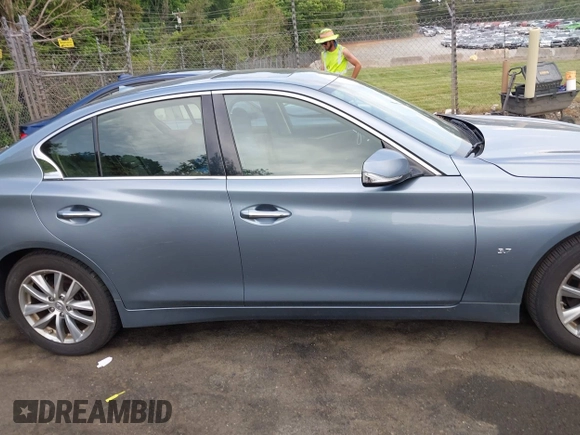 2015 Infiniti Q50 with VIN JN1BV7AR9FM418836, listed as a IAAI auction lot 42181355 with 165,787 mi miles and . Bid and sale history available at DreamBid. Image 14.