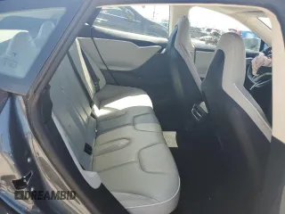 2013 Tesla Model S Performance с VIN 5YJSA1CP1DFP26946, выставлен на аукционе Copart как лот 50133094 с пробегом 80 045 миль миль и Списание • Salvage title. История ставок и продаж доступна на DreamBid. Изображение 10.