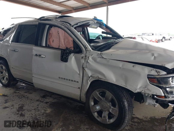 2019 Chevrolet Suburban Premier with VIN 1GNSKJKJ2KR354283, listed as a IAAI auction lot 39548082 with Not Provided miles and . Bid and sale history available at DreamBid. Image 13.