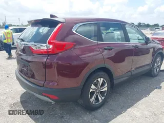 2019 Honda CR-V LX with VIN 2HKRW5H33KH402697, listed as a IAAI auction lot 41942219 with 80,826 mi miles. Bid and sale history available at carsss.com. Image 4.