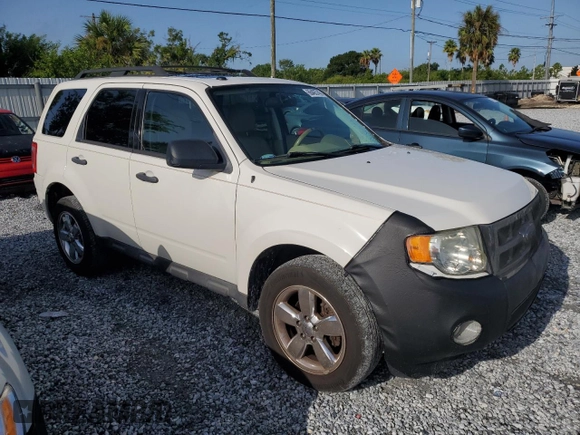 2012 Ford Escape XLT with VIN 1FMCU9DG8CKB75873, listed as a Copart auction lot 66405745 with 152,525 mi miles and Clean title. Bid and sale history available at DreamBid. Image 4.