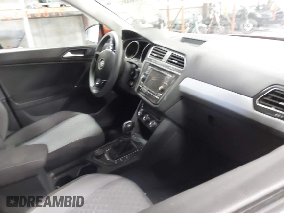 2018 Volkswagen Tiguan S with VIN 3VV0B7AX4JM019424, listed as a IAAI auction lot 41868852 with 50,889 mi miles and . Bid and sale history available at DreamBid. Image 5.