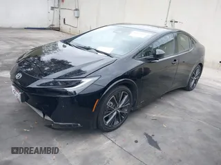 2024 Toyota Prius LE z VIN JTDADABU3R3015537, wystawiony jako IAAI lot #42063101 z przebiegiem 21 435 mil mil oraz . Historia ofert i sprzedaży dostępna na DreamBid. Obrazek 2.