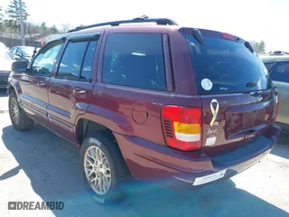 2003 Jeep Grand Cherokee Limited with VIN 1J4GW58S23C577383, listed as a IAAI auction lot 41957536 with 187,755 mi miles. Bid and sale history available at carsss.com. Image 3.