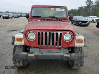 2002 Jeep Wrangler SE with VIN 1J4FA29P32P706533, listed as a Copart auction lot 43709055 with Not Provided miles and Salvage Title. Bid and sale history available at DreamBid. Image 5.