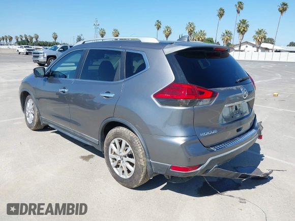 2017 Nissan Rogue SV with VIN KNMAT2MT9HP581822, listed as a IAAI auction lot 42140794 with 74,261 mi miles. Bid and sale history available at carsss.com. Image 3.