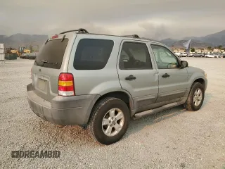 2005 Ford Escape XLT with VIN 1FMYU93Z35KC52175, listed as a Copart auction lot 71214694 with 125,278 mi miles and Salvage Title. Bid and sale history available at carsss.com. Image 3.