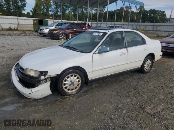 1996 Honda Accord EX with VIN 1HGCD5657TA001356, listed as a Copart auction lot 69712964 with 241,689 mi miles and Salvage Title. Bid and sale history available at DreamBid. Image 1.