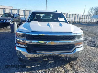 2017 Chevrolet Silverado 1500 LT with VIN 3GCUKREC8HG490827, listed as a IAAI auction lot 41810412 with 121,572 mi miles and . Bid and sale history available at DreamBid. Image 12.