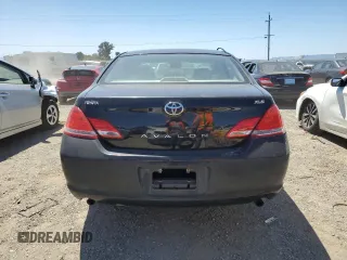 2007 Toyota Avalon XL z VIN 4T1BK36B37U221068, wystawiony jako Copart lot #58092985 z przebiegiem 168 743 mil mil oraz Szkoda całkowita • Salvage title. Historia ofert i sprzedaży dostępna na DreamBid. Obrazek 6.