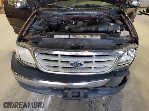 2000 Ford F-150 XL with VIN 1FTZX1726YKB41994, listed as a Copart auction lot 69300034 with Not provided miles and Salvage title. Bid and sale history available at DreamBid. Image 13.