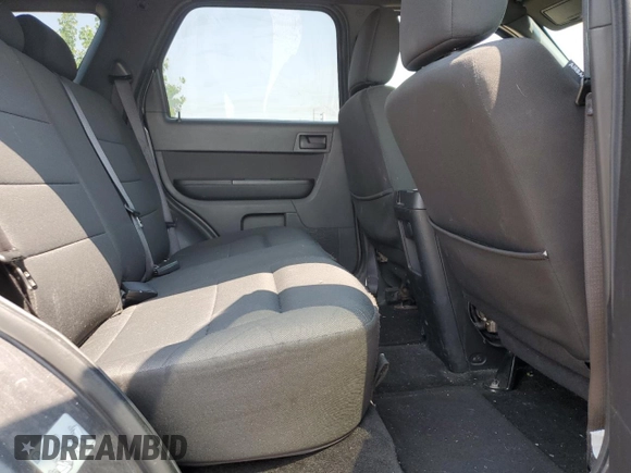2012 Ford Escape XLT z VIN 1FMCU9DG8CKB35535, wystawiony jako Copart lot #60202675 z przebiegiem 205 750 mil mil oraz Szkoda całkowita • Salvage title. Historia ofert i sprzedaży dostępna na DreamBid. Obrazek 11.