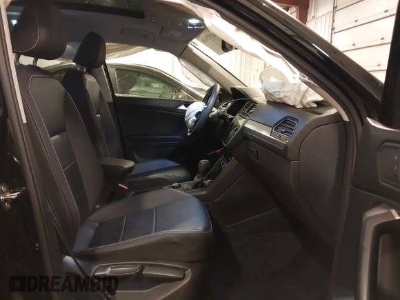 2021 Volkswagen Tiguan SE with VIN 3VV2B7AXXMM034880, listed as a IAAI auction lot 41979636 with 34,490 mi miles and . Bid and sale history available at DreamBid. Image 5.