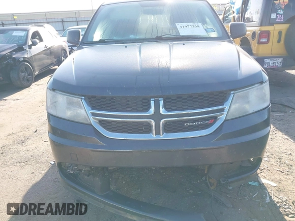 2017 Dodge Journey SE z VIN 3C4PDCAB9HT551840, wystawiony jako IAAI lot #41977338 z przebiegiem 202 856 mil mil oraz . Historia ofert i sprzedaży dostępna na DreamBid. Obrazek 12.