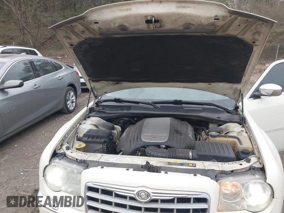 2006 Chrysler 300 C with VIN 2C3LA63H06H189644, listed as a IAAI auction lot 41718103 with 290,418 mi miles. Bid and sale history available at carsss.com. Image 10.