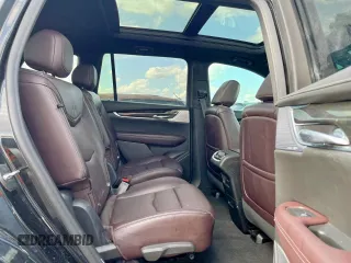 2020 Cadillac XT6 FWD Premium Luxury z VIN 1GYKPCRSXLZ104502, wystawiony jako Copart lot #58211275 z przebiegiem 97 053 mil mil oraz Szkody całkowita. Historia ofert i sprzedaży dostępna na DreamBid. Obrazek 11.
