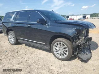 2023 Cadillac Escalade 4WD Premium Luxury with VIN 1GYS4BKLXPR352812, listed as a Copart auction lot 63633554 with 12,434 mi miles and Salvage Title. Bid and sale history available at carsss.com. Image 4.