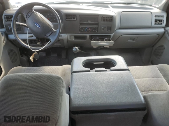 2004 Ford F-250 XL with VIN 1FTNX21P04EA92082, listed as a Copart auction lot 55311935 with 217,363 mi miles and Salvage title. Bid and sale history available at DreamBid. Image 8.